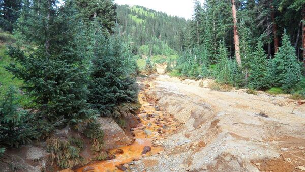 A contaminated plume of waste water accidentally released from a Colorado gold mine by U.S. environmental agency workers has spread downstream. A contaminated plume of waste water accidentally released from a Colorado gold mine by U.S. environmental agency workers has spread downstream. - Sputnik International