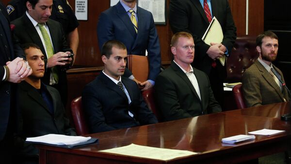 (L to R seated) Andrew Rossig, Marco Markovich, James Brady and Kyle Hartwell appear in Manhattan Criminal Court in New York May 6, 2014 - Sputnik International
