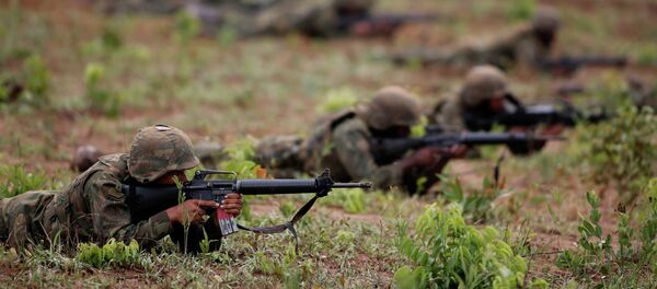 Brazilian Marines take part in a military training in the Formosa Training Camp, in the state of Goias, north of Brasilia, Brazil, Oct. 29, 2014. File photo Brazilian Marines take part in a military training in the Formosa Training Camp, in the state of Goias, north of Brasilia, Brazil, Oct. 29, 2014. File photo - Sputnik International