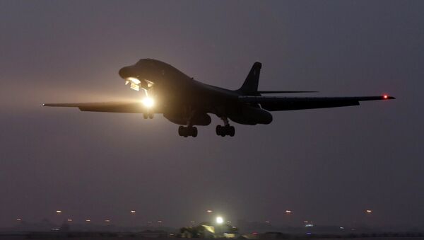 In this photo taken Monday, March 9, 2015, a B-1 bomber prepares to land after finishing a mission at the al-Udeid Air Base in Doha, Qatar - Sputnik International