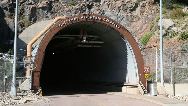 The portal into the bowels of the Cheyenne Mountain complex is shown in this photograph taken on Tuesday, Sept. 5, 2006, near Colorado Springs, Colo. The country's super-secret nerve center will be put on warm standby by the military and operations shifted to nearby Peterson Air Force Base in an effort to save money. - Sputnik International