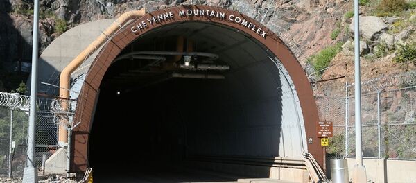 The portal into the bowels of the Cheyenne Mountain complex is shown in this photograph taken on Tuesday, Sept. 5, 2006, near Colorado Springs, Colo. The country's super-secret nerve center will be put on warm standby by the military and operations shifted to nearby Peterson Air Force Base in an effort to save money. The portal into the bowels of the Cheyenne Mountain complex is shown in this photograph taken on Tuesday, Sept. 5, 2006, near Colorado Springs, Colo. The country's super-secret nerve center will be put on warm standby by the military and operations shifted to nearby Peterson Air Force Base in an effort to save money. - Sputnik International