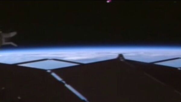 UFO spotted over ISS in NASA live stream footage. - Sputnik International