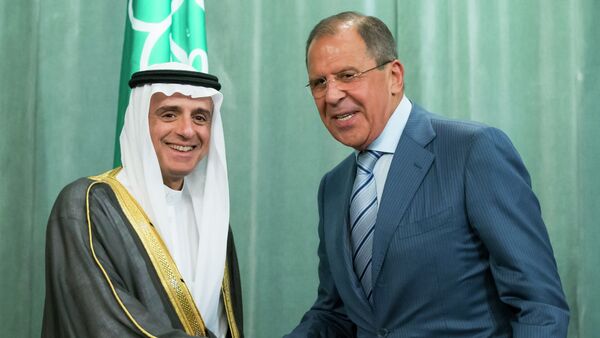 Russian Foreign Minister, Sergey Lavrov, right, and Saudi Arabia Foreign Minister, Adel bin Ahmed Al-Jubeir, shake hands after a news conference following their meeting in Moscow, Russia, Tuesday, Aug. 11, 2015 - Sputnik International