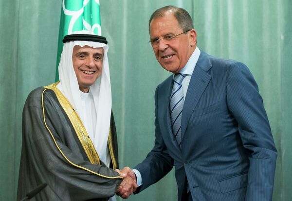 Russian Foreign Minister, Sergey Lavrov, right, and Saudi Arabia Foreign Minister, Adel bin Ahmed Al-Jubeir, shake hands after a news conference following their meeting in Moscow, Russia, Tuesday, Aug. 11, 2015 - Sputnik International