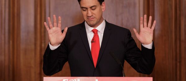 Britain's Labour Party leader Ed Miliband holds up his hands as he delivers his resignation at a press conference in Westminster, London, Friday, May 8, 2015 Britain's Labour Party leader Ed Miliband holds up his hands as he delivers his resignation at a press conference in Westminster, London, Friday, May 8, 2015 - Sputnik International