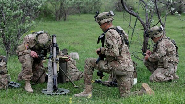 US soldier aims a mortar during the joint US-Georgia military exercise Noble Partner 2015 at the military base of Vaziani outside Tbilisi, Georgia, Sunday, May 17, 2015 - Sputnik International