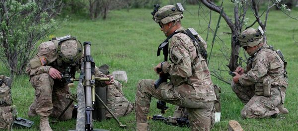 US soldier aims a mortar during the joint US-Georgia military exercise Noble Partner 2015 at the military base of Vaziani outside Tbilisi, Georgia, Sunday, May 17, 2015 US soldier aims a mortar during the joint US-Georgia military exercise Noble Partner 2015 at the military base of Vaziani outside Tbilisi, Georgia, Sunday, May 17, 2015 - Sputnik International