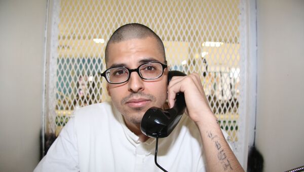 In this Aug. 5, 2015 photo, Daniel Lee Lopez, 27, speaks from a visiting cage outside death row at the Texas Department of Criminal Justice Polunsky Unit near Livingston, Texas - Sputnik International