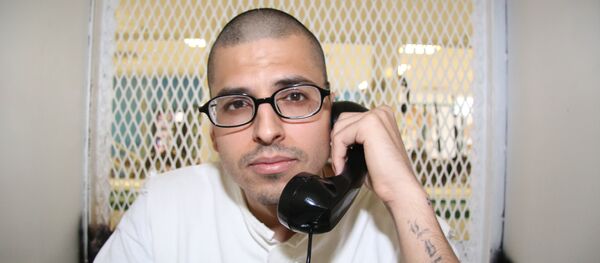 In this Aug. 5, 2015 photo, Daniel Lee Lopez, 27, speaks from a visiting cage outside death row at the Texas Department of Criminal Justice Polunsky Unit near Livingston, Texas - Sputnik International