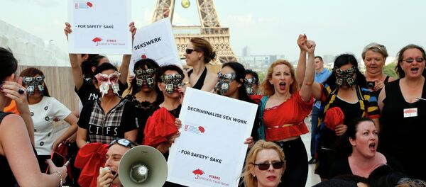 Sex workers take part in a demonstration called by the Strass union and the Roses d'Acier association on June 5, 2015 on the Trocadero square in Paris Sex workers take part in a demonstration called by the Strass union and the Roses d'Acier association on June 5, 2015 on the Trocadero square in Paris - Sputnik International