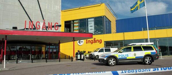 Police cars are parked outside IKEA store in the city of Vaesteraas, about 100 km west of Stockholm on August 10, 2015 - Sputnik International