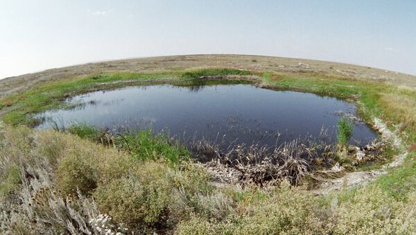 A lake in the place of a surface nuclear explosion on the Semipalatinsk proving ground - Sputnik International