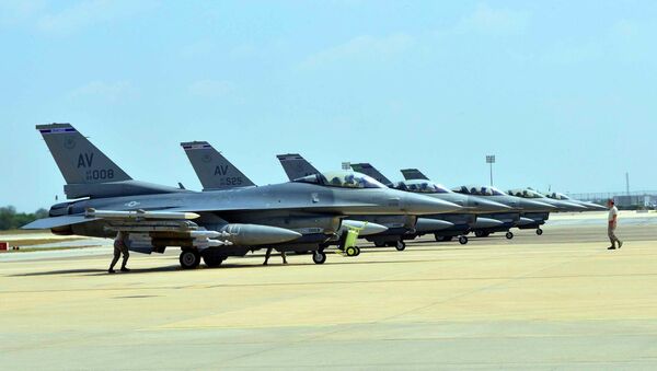 Six US Air Force F-16 Fighting Falcons from Aviano Air Base, Italy, are seen at Incirlik Air Base, Turkey, after being deployed, in this US Air Force handout picture taken August 9, 2015 - Sputnik International