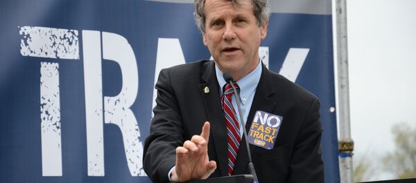 Senator Sherrod Brown participates in a #StopFastTrack rallies in Washington in April Senator Sherrod Brown participates in a #StopFastTrack rallies in Washington in April - Sputnik International