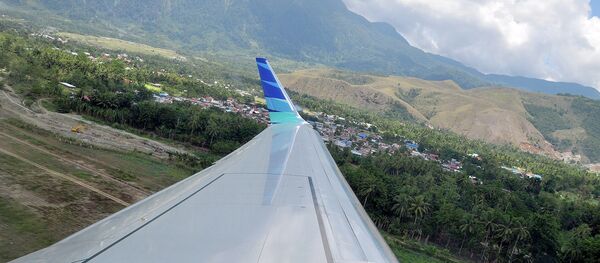 A view from a plane that is taking off of Sentani Airport, Papua A view from a plane that is taking off of Sentani Airport, Papua - Sputnik International