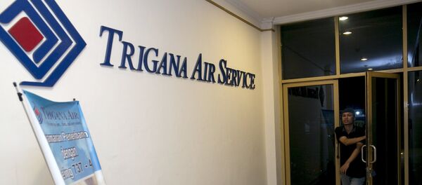 A man walks into the entrance of Trigana Air's office in Jakarta, Indonesia August 16, 2015 A man walks into the entrance of Trigana Air's office in Jakarta, Indonesia August 16, 2015 - Sputnik International