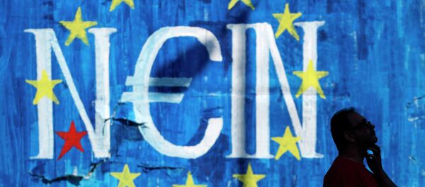 A man walks past a graffiti made by street artist N_Grams showing the EU flag and the German word for 'no', but with the letter 'e' in the shape of the Euro symbol, in Athens - Sputnik International