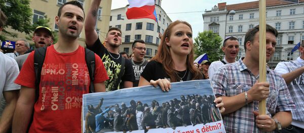 Ant-migrants protesters attend an anti-Islam and immigration rally on June 26, 2015 in Brno, Czech Republic - Sputnik International