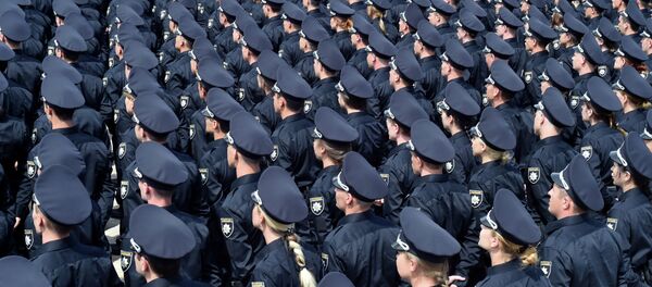 Police officers attend an official swearing-in ceremony in Kiev on July 4, 2015 - Sputnik International