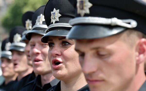 Ukranian police officers are sworn in during an official ceremony in Kiev, on July 4, 2015 Ukranian police officers are sworn in during an official ceremony in Kiev, on July 4, 2015 - Sputnik International