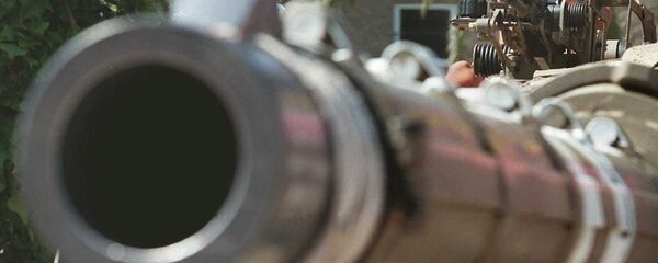 An Israeli child plays behind a heavy machine gun on a Merkava tank at the Rabin Square in Tel Aviv An Israeli child plays behind a heavy machine gun on a Merkava tank at the Rabin Square in Tel Aviv - Sputnik International