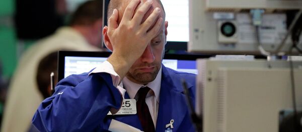 Specialist Meric Greenbaum works at his post on the floor of the New York Stock Exchange, Wednesday, Aug. 12, 2015 Specialist Meric Greenbaum works at his post on the floor of the New York Stock Exchange, Wednesday, Aug. 12, 2015 - Sputnik International