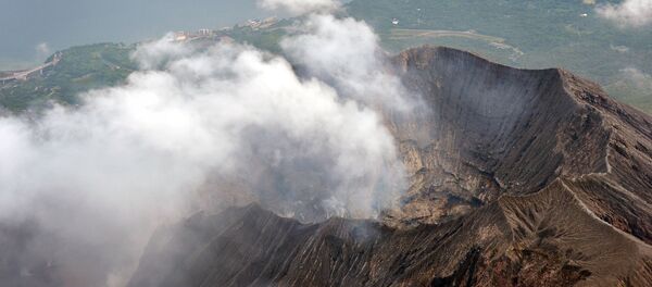 An aerial view shows the crater atop Mt. Sakurajima in Kagoshima, southwestern Japan, in this photo taken by Kyodo August 15, 2015 An aerial view shows the crater atop Mt. Sakurajima in Kagoshima, southwestern Japan, in this photo taken by Kyodo August 15, 2015 - Sputnik International
