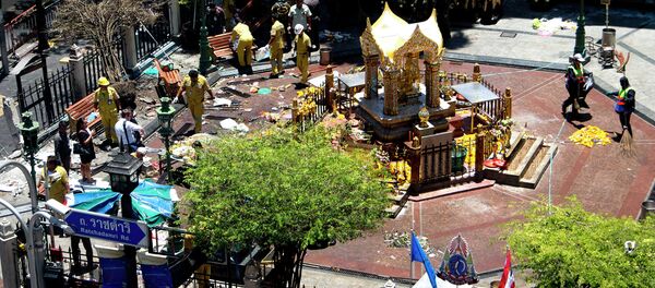 Investigations continue at the Erawan Shrine the morning after an explosion in Bangkok, Thailand, Tuesday, Aug. 18, 2015 Investigations continue at the Erawan Shrine the morning after an explosion in Bangkok, Thailand, Tuesday, Aug. 18, 2015 - Sputnik International