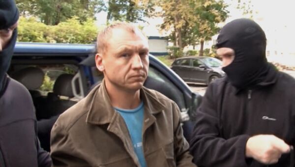 Employee of the Tartu Department of Estonian Security Police (KAPO) Eston Kohver (center) detained in the Pskov Region near the building of Moscow's Lefortovo Court - Sputnik International