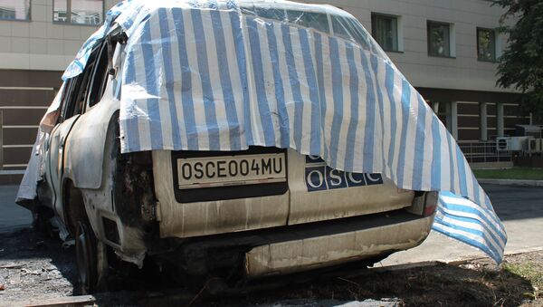 Six OSCE mission cars burned in Donetsk - Sputnik International