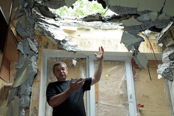 Aftermath of artillery attack on Donetsk Aftermath of artillery attack on Donetsk - Sputnik International