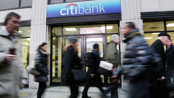 People walk past a branch office of Citibank, Thursday, Jan. 15, 2015, in New York - Sputnik International