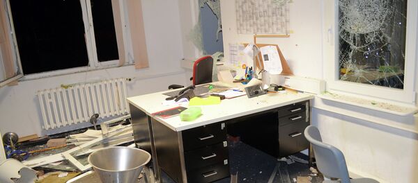 An office at the first registration center for refugees is destroyed in Suhl, eastern germany, on August 20, 2015 - Sputnik International