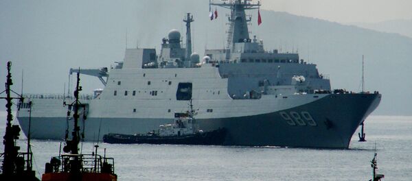 The amphibious warfare ship Changbaishang that has arrived in Vladivostok together with six other Chinese warships for the second stage of the Naval Cooperation 2015 exercise - Sputnik International