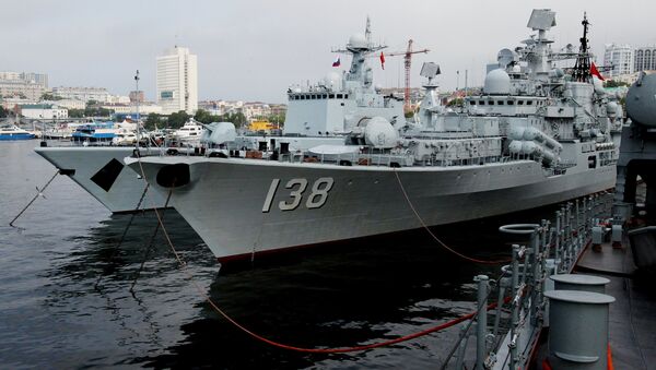 From left: The destroyers Shenyang and Taizhou that have arrived in Vladivostok together with five other Chinese warships for the second stage of the Naval Cooperation 2015 exercise - Sputnik International