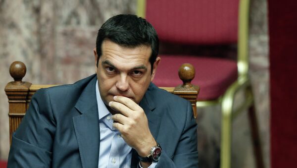 Greek Prime Minister Alexis Tsipras listens during a parliamentary session in Athens, Friday, Aug. 14, 2015 - Sputnik International