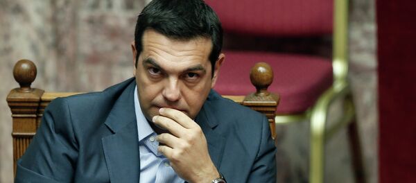 Greek Prime Minister Alexis Tsipras listens during a parliamentary session in Athens, Friday, Aug. 14, 2015 Greek Prime Minister Alexis Tsipras listens during a parliamentary session in Athens, Friday, Aug. 14, 2015 - Sputnik International