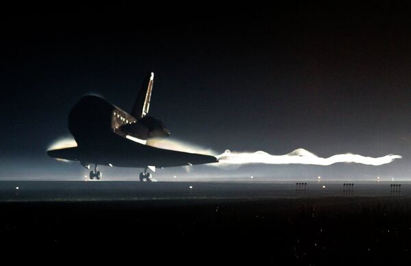 The Space Shuttle Atlantis landing at the Kennedy Space Center at Cape Canaveral, Florida, Thursday, July 21, 2011. The Space Shuttle program was retired upon Atlantis's return. - Sputnik International