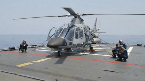 A Philippine Navy weaponised AW109 helicopter on board the frigate BRP Ramon Alcaraz. - Sputnik International