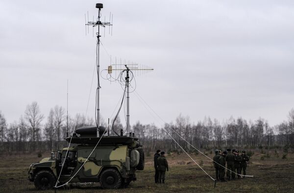 Leer-2, a new radio suppression complex integrated into the Tigr vehicle, is demonstrated at the Babino testing grounds in the Tula region Leer-2, a new radio suppression complex integrated into the Tigr vehicle, is demonstrated at the Babino testing grounds in the Tula region - Sputnik International
