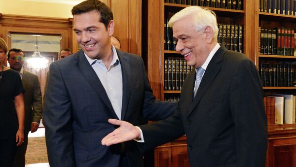 Greek Prime Minister Alexis Tsipras (L) is greeted by Greek President Prokopis Pavlopoulos at the presidental palace in Athens on August 20, 2015 - Sputnik International
