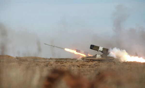 The TOS-1A multiple rocket launcher during a military exercise at the Prudboi training ground, Volgograd Region The TOS-1A multiple rocket launcher during a military exercise at the Prudboi training ground, Volgograd Region - Sputnik International