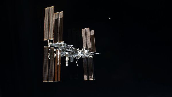 This picture of the International Space Station was photographed from the space shuttle Atlantis as the orbiting complex and the shuttle performed their relative separation in the early hours. File photo - Sputnik International