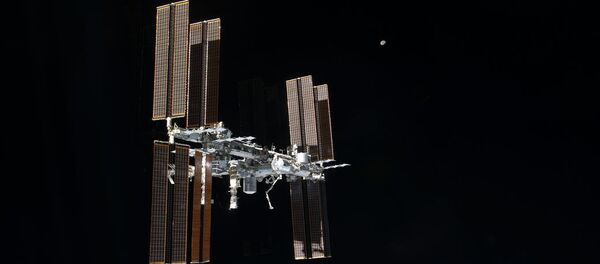 This picture of the International Space Station was photographed from the space shuttle Atlantis as the orbiting complex and the shuttle performed their relative separation in the early hours. File photo - Sputnik International