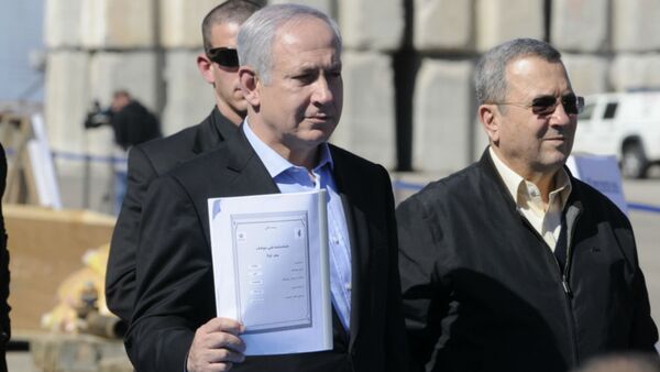 Prime Minister Mr. Benjamin Netanyahu and Defense Minister, Mr. Ehud Barak hold an Iranian instruction manual for the C-704 anti-ship missile. - Sputnik International