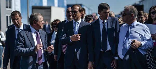 Russian Minister of Industry and Trade Denis Manturov (center) attends the final rehearsal of the opening of the MAKS 2015 International Aviation and Space Salon Russian Minister of Industry and Trade Denis Manturov (center) attends the final rehearsal of the opening of the MAKS 2015 International Aviation and Space Salon - Sputnik International