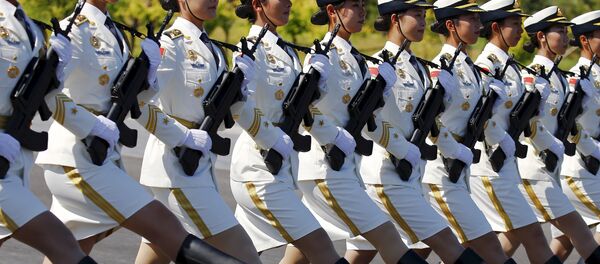 Soldiers of China's People's Liberation Army march with their weapons during a training session for a military parade to mark the 70th anniversary of the end of World War Two, at a military base in Beijing, China, August 22, 2015 Soldiers of China's People's Liberation Army march with their weapons during a training session for a military parade to mark the 70th anniversary of the end of World War Two, at a military base in Beijing, China, August 22, 2015 - Sputnik International