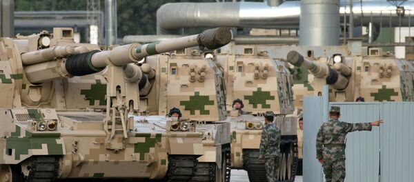 Chinese self propelled howitzers prepare to take part in rehearsals ahead of the Sept. 3 military parade to commemorate the end of World War II in Beijing, Saturday, Aug. 22, 2015 Chinese self propelled howitzers prepare to take part in rehearsals ahead of the Sept. 3 military parade to commemorate the end of World War II in Beijing, Saturday, Aug. 22, 2015 - Sputnik International