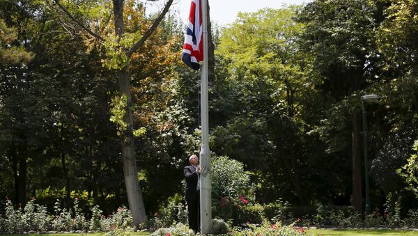Gary Thompson, overseas security manager at Britain's Foreign and Commonwealth Office, raises the Union flag at British Embassy in Tehran, Iran - Sputnik International